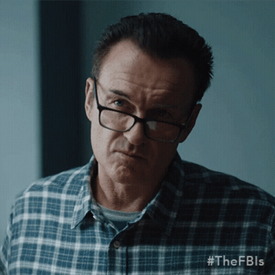 A Man Wearing Glasses And A Plaid Shirt Has #Thefbls Written On The Bottom Of His Shirt GIF