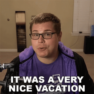 A Man Wearing Glasses And A Purple Shirt Says " It Was A Very Nice Vacation " GIF
