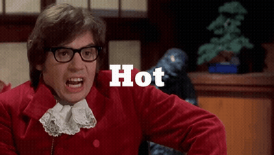 A Man Wearing Glasses And A Red Jacket Has The Word Hot Written Above Him GIF