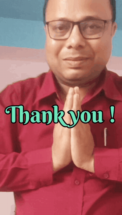 a man wearing glasses and a red shirt says " thank you "