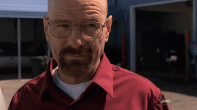 A Man Wearing Glasses And A Red Shirt That Says A.m.c. GIF