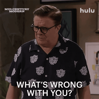 A Man Wearing Glasses And A Shirt Says What 'S Wrong With You GIF