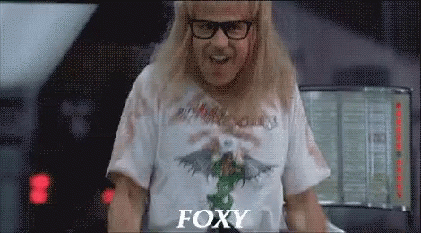 A Man Wearing Glasses And A Shirt That Says Foxy On It GIF