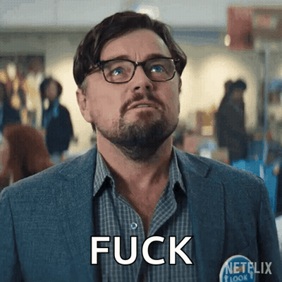 A Man Wearing Glasses And A Shirt That Says Fuck GIF
