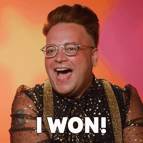 A Man Wearing Glasses And A Shirt That Says " I Won " GIF