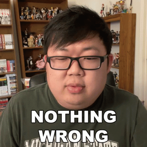 A Man Wearing Glasses And A Shirt That Says Nothing Wrong On It GIF