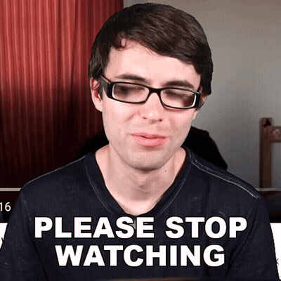 A Man Wearing Glasses And A Shirt That Says Please Stop Watching GIF