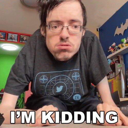 A Man Wearing Glasses And A Shirt That Says Tv On It GIF