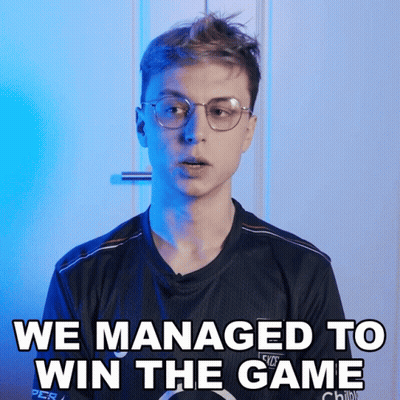 A Man Wearing Glasses And A Shirt That Says We Managed To Win The Game GIF