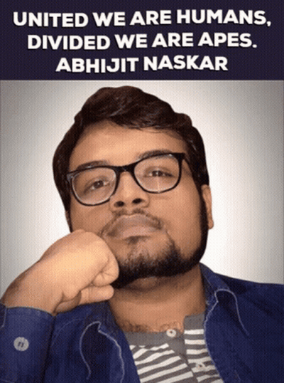 A Man Wearing Glasses And A Striped Shirt With The Words United We Are Humans Divided We Are Apes Written Above Him GIF