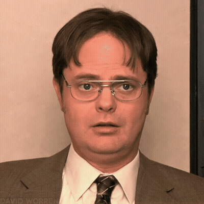 A Man Wearing Glasses And A Suit Has David Worren Written On The Bottom Right GIF