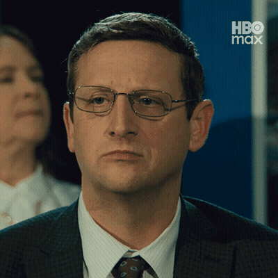 A Man Wearing Glasses And A Suit Has Hbo Max Written On The Bottom GIF
