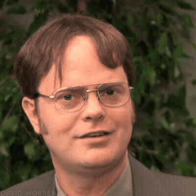 A Man Wearing Glasses And A Suit Has The Name David Worren On The Bottom GIF
