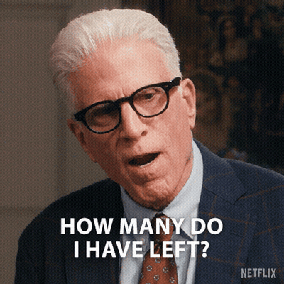 A Man Wearing Glasses And A Suit Is Asking How Many Do I Have Left GIF