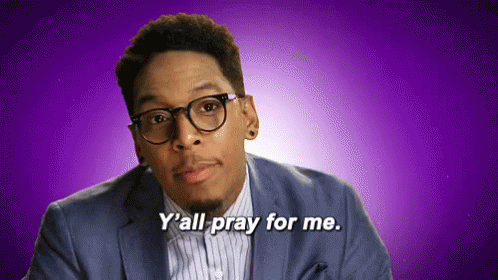 A Man Wearing Glasses And A Suit Is Saying Y 'All Pray For Me GIF