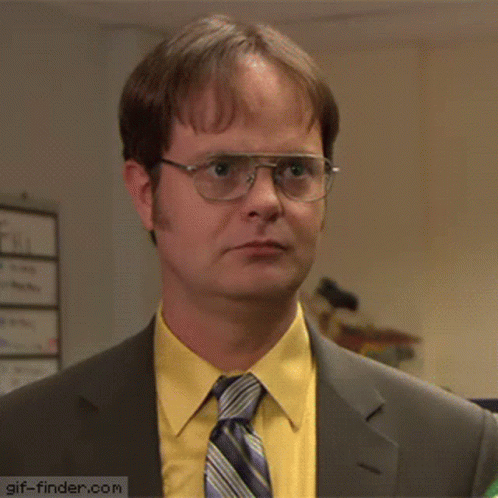 A Man Wearing Glasses And A Suit Says Are You Serious GIF