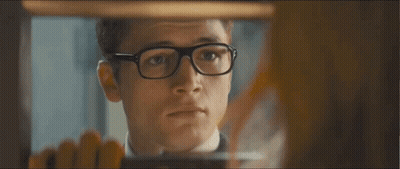 A Man Wearing Glasses And A Suit Says I 'Ll Be Right Back GIF