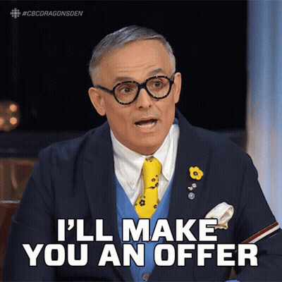 A Man Wearing Glasses And A Suit Says I 'Ll Make You An Offer GIF