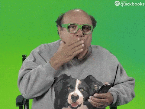 A Man Wearing Glasses And A Sweater With A Dog On It Is Saying Pay Me GIF