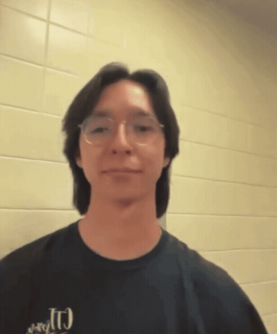 A Man Wearing Glasses And A T-Shirt That Says J.r.g.t. GIF