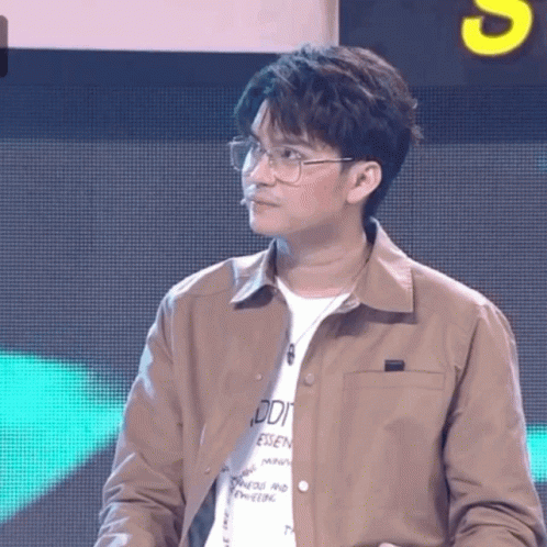 A Man Wearing Glasses And A T-Shirt That Says Odi GIF