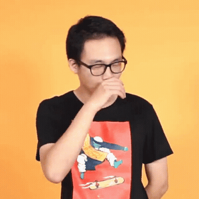 A Man Wearing Glasses And A T-Shirt With A Skateboard On It GIF