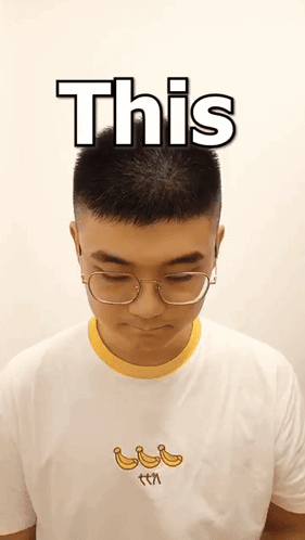 A Man Wearing Glasses And A T-Shirt With Bananas On It Says " This " GIF