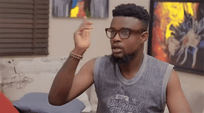 A Man Wearing Glasses And A Tank Top That Says " Original " On It GIF
