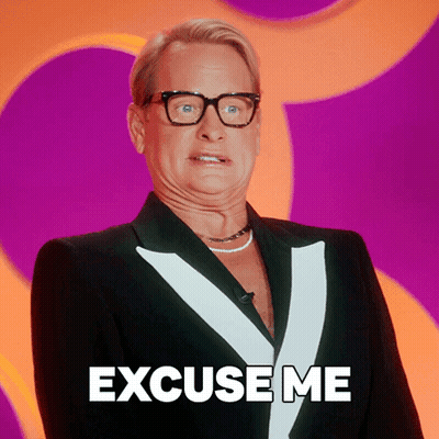 A Man Wearing Glasses And A Tuxedo Says Excuse Me GIF