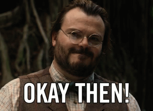 A Man Wearing Glasses And A Vest Says " Okay Then " GIF
