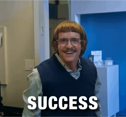 A Man Wearing Glasses And A Vest With The Word Success Written On It GIF
