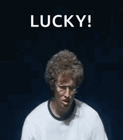 A Man Wearing Glasses And A Watch Is Making A Funny Face And Holding His Hands Up In The Air . GIF
