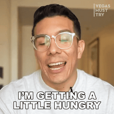 A Man Wearing Glasses And A White Shirt Says I 'M Getting A Little Hungry GIF