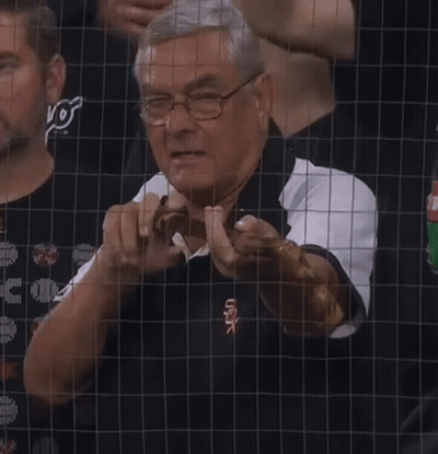 A Man Wearing Glasses And A White Sox Shirt GIF