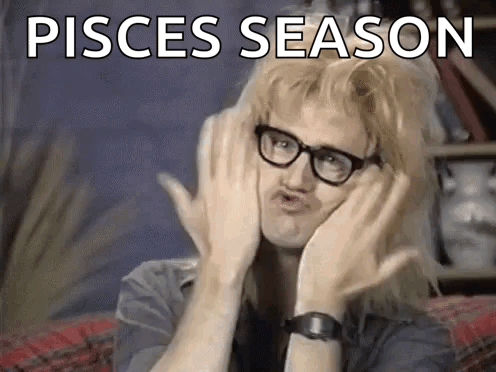 A Man Wearing Glasses And A Wig Is Making A Funny Face While Holding His Hands To His Face . GIF