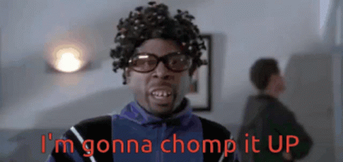 A Man Wearing Glasses And A Wig Is Saying I 'M Gonna Chomp It Up GIF
