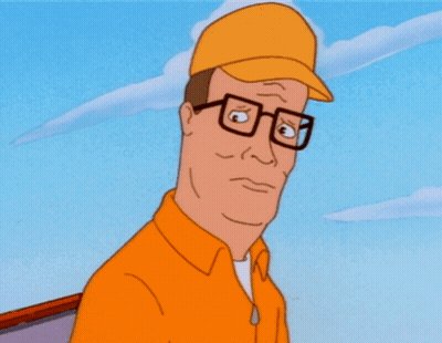 A Man Wearing Glasses And A Yellow Hat Is Looking Down GIF