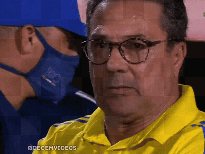 A Man Wearing Glasses And A Yellow Shirt With The Hashtag Acecemvideos On The Bottom GIF