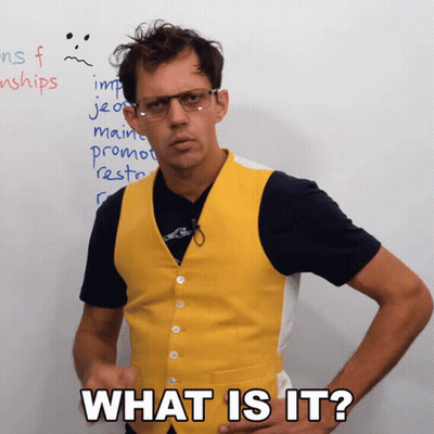 A Man Wearing Glasses And A Yellow Vest Asks What Is It GIF