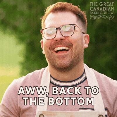 A Man Wearing Glasses And An Apron Is Laughing With The Words Aww Back To The Bottom Below Him GIF