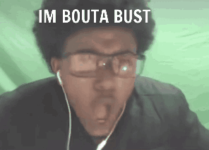 A Man Wearing Glasses And Earbuds Is Making A Funny Face And The Words Im Bouta Bust Are Above Him GIF