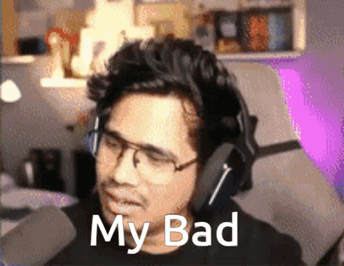 A Man Wearing Glasses And Headphones Has The Words My Bad On His Face GIF