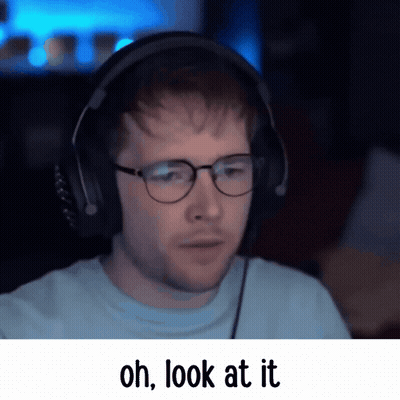 A Man Wearing Glasses And Headphones Has The Words Oh Look At It Below Him GIF