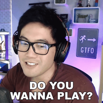 A Man Wearing Glasses And Headphones Is Asking If He Wanna Play GIF