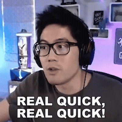 A Man Wearing Glasses And Headphones Is Saying Real Quick Real Quick GIF