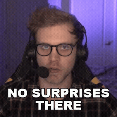 A Man Wearing Glasses And Headphones Is Sitting In Front Of A Microphone And Says No Surprises There . GIF