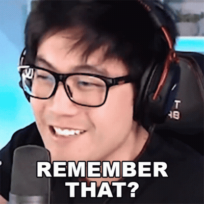 A Man Wearing Glasses And Headphones Is Smiling And Saying " Remember That " GIF