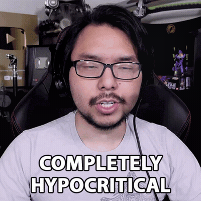 A Man Wearing Glasses And Headphones Says " Completely Hypocritical " GIF