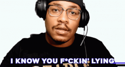 a man wearing glasses and headphones says i know you f * cking lying