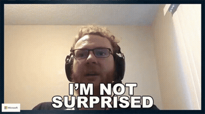 A Man Wearing Glasses And Headphones Says " I 'M Not Surprised " GIF
